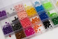 Multicolored beads for the children's educational aqua mosaic game