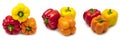 Multicolored bell peppers on a white background. Red, orange and yellow bell peppers. Royalty Free Stock Photo