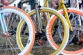 Multicolored bicycle wheels closeup