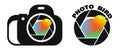 Multicolored bird peeps out of camera lens. Creative logo for a photo studio and professional photographer. World Photography Day