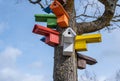 Multicolored Birdhouses.Colored nesting box. Colorful Bird Houses. Houses for birds on a tree