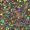 Multicolored blots on a black background. Seamless pattern. Pebbles, stones. Royalty Free Stock Photo