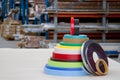 Multicolored bobbins of PVC edge and melanin for the manufacture of furniture. Lie pyramid. Royalty Free Stock Photo