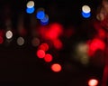 Multicolored bokeh background. Defocused abstract red, blue and white light circles. Royalty Free Stock Photo