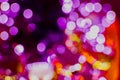 Multicolored bokeh. New Year garlands. Festive mood. Texture.