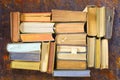 Multicolored books, flat lay, on rust background,reading, education, literature,learning Royalty Free Stock Photo