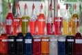 Multicolored bottles of flavored syrup