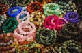 Multicolored bracelets of brilliant round stones. Chiang Mai Night Market. Thailand