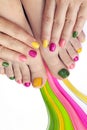 Multicolored bright manicure and pedicure Royalty Free Stock Photo