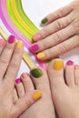 Multicolored bright manicure and pedicure Royalty Free Stock Photo