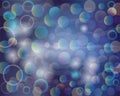 Multicolored bubbles and circles on dark background. Bokeh and blurred abstract shapes, flickering lights. Royalty Free Stock Photo