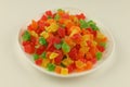 Multicolored candied fruits in a plate