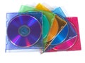 Multicolored CD, DVD disks in color boxes Royalty Free Stock Photo