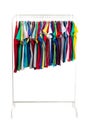 Multicolored clothes on hangers, isolate