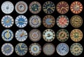 Multicolored collection of ancient church tower clocks on a pile Royalty Free Stock Photo