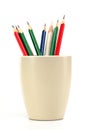 Multicolored color pencils in a coffee cup Royalty Free Stock Photo