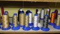 Multicolored colored threads. sewing shop. rolls of thread in the factory production of fabrics Royalty Free Stock Photo