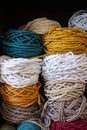 Multicolored cotton balls of yarn and ropes for macrame close up Royalty Free Stock Photo