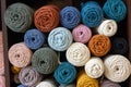 Multicolored cotton balls of yarn and ropes for macrame close up Royalty Free Stock Photo