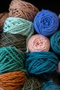 Multicolored cotton balls of yarn and ropes for macrame close up Royalty Free Stock Photo