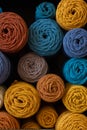 Multicolored cotton balls of yarn and ropes for macrame close up Royalty Free Stock Photo