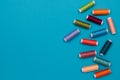 Multicolored cotton threads, spools, handmade sewing. Top view with copyspace, flat lay. Royalty Free Stock Photo