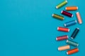 Multicolored cotton threads, spools, handmade sewing. Top view with copyspace, flat lay. Royalty Free Stock Photo