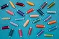 Multicolored cotton threads, spools, handmade sewing. Top view with copyspace, flat lay. Royalty Free Stock Photo