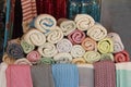 Multicolored cotton towels with graphic ornament for hamam on the counter of the oriental bazaar Royalty Free Stock Photo