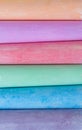 Multicolored crayons, pastel. stripes, lines, gentle. Green, yellow, pink, purple, blue. Painted Pastels white blackboard Royalty Free Stock Photo