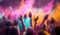 Multicolored crowd painted hands up with various colors hues during lively Holi festival on Indian street. Burst of colors and