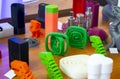 Multicolored 3D printed models close-up. Objects printed on 3D printer