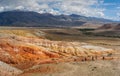 A multicolored desert relief in the mountains in Altai Royalty Free Stock Photo