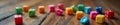 Multicolored dice scattered on a wooden table tabletop colorful