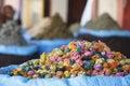 Multicolored dried flowers, used for soaps and perfumes, on sale in the souks of Marrakesh`s medina area in Morocco