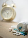 Multicolored of Drug and capsule is on the wooden table. Closeup. We are against drugs anti drugs, cure in container for health. Royalty Free Stock Photo