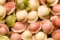 Multicolored dumplings are cooked in the kitchen