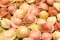 Multicolored dumplings are cooked in the kitchen