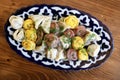 Multicolored dumplings on plate