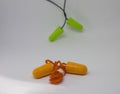 Multi-colored earplugs isolated on a white background. Close-up. Selective focus Royalty Free Stock Photo