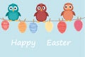 Multicolored Easter eggs made of paper hanging on a rope. Cute owls sitting. Vector. Royalty Free Stock Photo