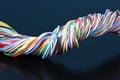 Multicolored electrical cable on dark background Royalty Free Stock Photo
