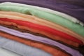 Multicolored fabric. Pile colored textiles.