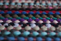 Multicolored fabric texture and background. Close up view of colorful carpet with selective focus. Royalty Free Stock Photo