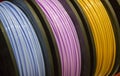 Multicolored filaments of plastic for printing on 3D printer close-up Royalty Free Stock Photo