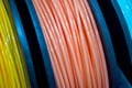 Multicolored filaments of plastic for printing on 3D printer close-up Royalty Free Stock Photo