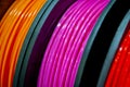 Multicolored filaments of plastic for printing on 3D printer close-up Royalty Free Stock Photo