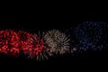 Multicolored fireworks. Red, golden, blue flash, copy space, abstract holiday background.