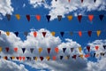 Multicolored flags against the blue sky Royalty Free Stock Photo