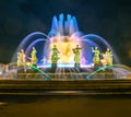 Multicolored fountain of the friendship of nations on VDNKH at night, Moscow, Russia